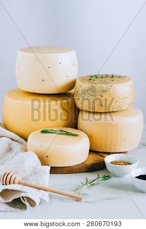 Assorted Cachotta Cheese Head With Black Cumin, Fenugreek And Herbs On White Background
