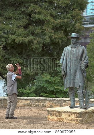 Austin, Texas - September 23, 2018: A Tourist Taking Picture Of Stevie Ray Vaughan Statue, Work By R