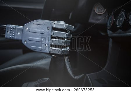 Robot Hand On Car Gearstick. Robot Pilot Is Driving A Car. Automatic Driver Concept.