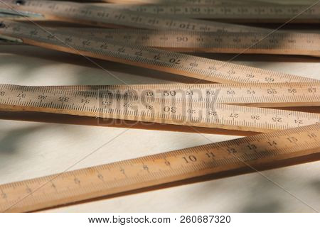 Wooden Ruler With Black Digits Background. Science And Education Instruments.