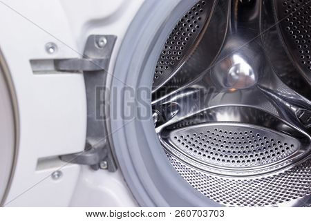 Washing Machine Drum Close Up, Laundry Concept.