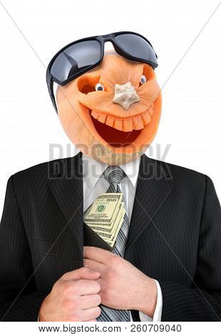 Portrait Of Jack Lantern  From Pumpkin In Black Business Suit. Jack Lantern Keeps Money In His Hands