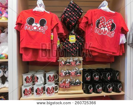 Orlando, Usa - May 10, 2018: The Colorful T-shirts And Cups With Mickey Mouse At Disney Store Indoor