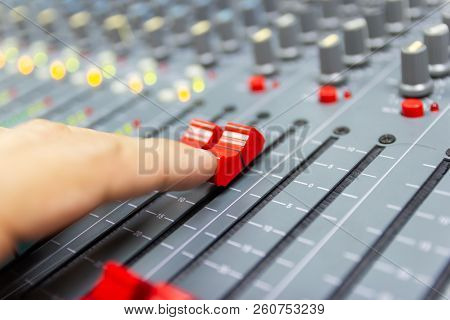 Close-up Hand Of Man Control Mixing Console Of A Big Hifi System The Audio Equipment, Control Panel 
