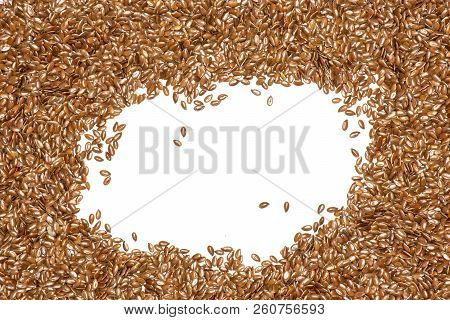 Lot Of Whole Fresh Brown Flaxseeds With Space For Text In A Centre Flatlay Isolated On White Backgro