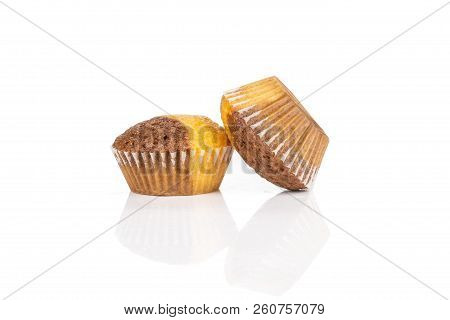 Group Of Two Whole Tasty Fresh Baked Marble Muffin Isolated On White Background