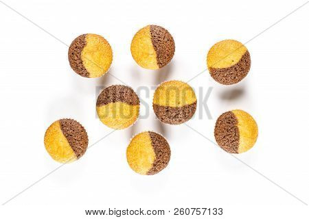 Group Of Eight Whole Fresh Baked Marble Muffin Flatlay Isolated On White Background