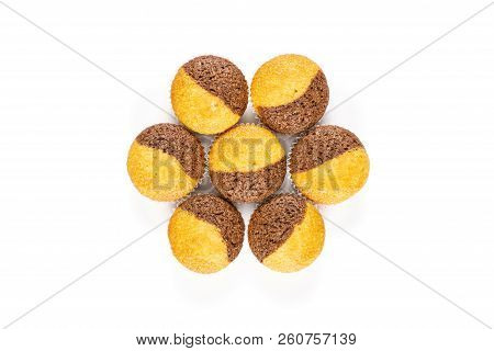 Group Of Seven Whole Sweet Fresh Baked Marble Muffin Flatlay Isolated On White Background