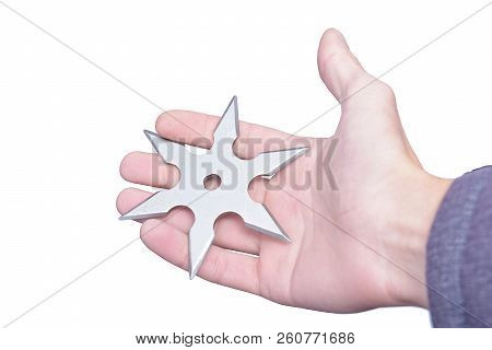 Metal Shuriken Ninja In Right Hand Isolate On White Background