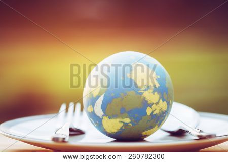 Globe Model Placed On Plate With Fork Spoon For Serve Menu In Famous Hotels. International Cuisine I