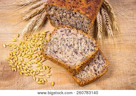 Multi-grain Bread On A Wooden Background. Healthy Food Concept.