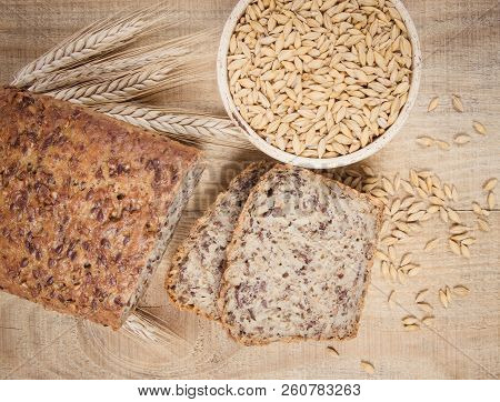 Multi-grain Bread On A Wooden Background. Healthy Food Concept.