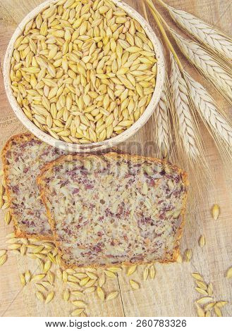 Multi-grain Bread On A Wooden Background. Healthy Food Concept.