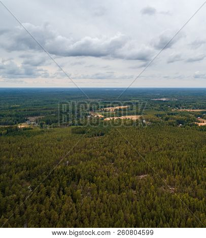 Aerial View From High Altitude Of The Forest Outside Tammisaari Finland On A Day Without Sunshine