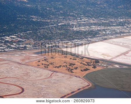Aerial View Of Bedwell Bayfront Park, Salt Evaporation Ponds, Cities And Nature Surrounding San Fran
