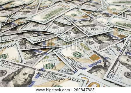 Scattered One Hundred Dollas Banknotes Close Up Background