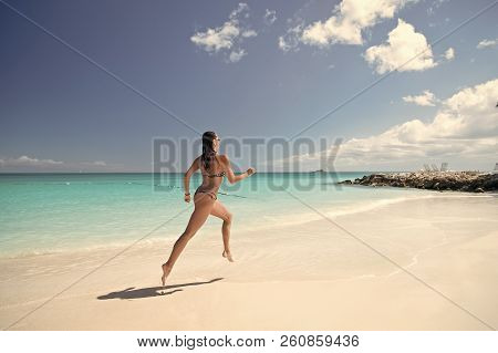 Woman Runing With Beautiful Body In Swimsuit Running In Ocean Water Sunny Day At Tropicl Beach, Spor