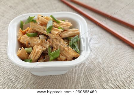 Chinese and Korean yuba salad with green onion and sesame seeds