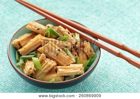 Chinese and Korean yuba salad with green onion and sesame seeds