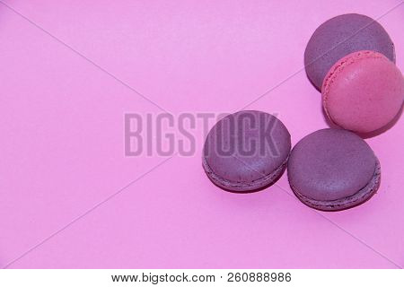 Macaroni On A Gently Pink Background. Delicious Cakes For Tea. Dessert Close-up.