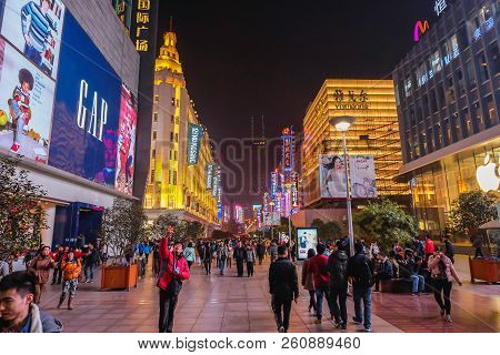 Shanghai/china -  January 24 2015: Night Life Of People Walking In Nanjing Road Walking Street In Sh