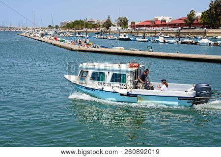 Olhau, Portugal - June 12, 2017 - View Of Boats And Yachts Moored In The Marina With The Promenade (