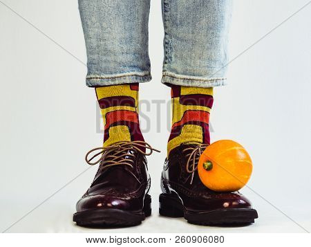 Beautiful Pumpkins And Men's Legs In Stylish Shoes