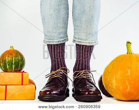 Beautiful Pumpkins And Men's Legs In Stylish Shoes
