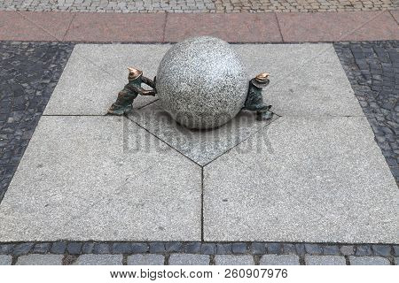 Wroclaw, Poland - May 11, 2018: Sisyphus Gnomes Of Dwarves Small Statues In Wroclaw, Poland. Wroclaw