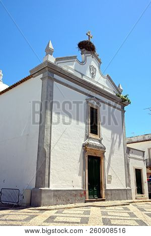 Rear Entrance To The Mother Church (matriz De Nossa Senhora Do Rosario) In The Old Town, Olhau, Alga