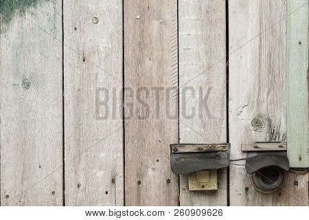 Vintage Lightswitch And Power Socket On Wooden Backround