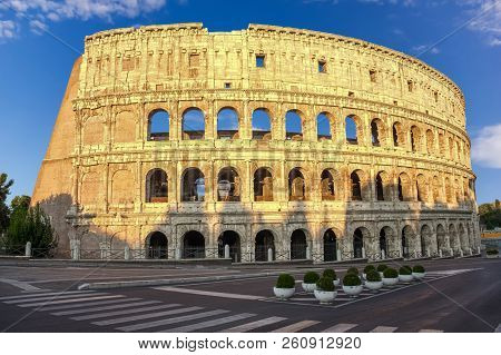 Roman Colosseum Under The Blue Sky, Rome, Italy