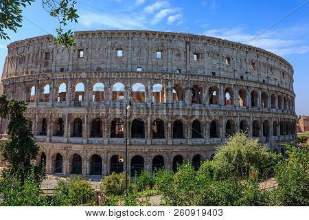 View Of The Roman Coliseum Under The Beautiful Sky, Italy