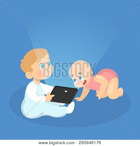 Little Kid Playing With A Tablet Computer