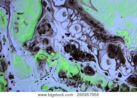 Abstract texture. Modern artwork background. Mixed black green and blue pianting. Fluid Art. Unusual trendy background for poster, card, invitation. Contemporary art.