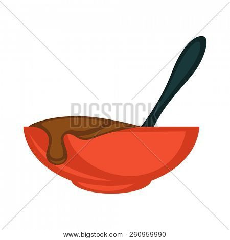Red bowl with hot melted chocolate and black spoon