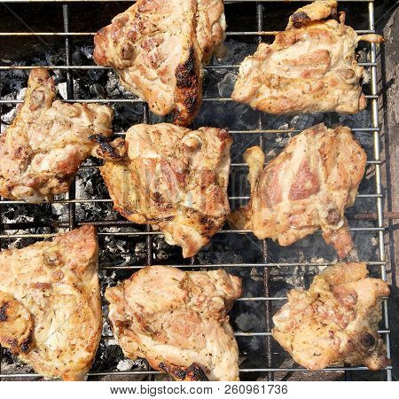 Beautiful Tasty Food From Slice Grilled Chicken Meats, Roast On Metal Brazier. Meat Of Bird With Cri