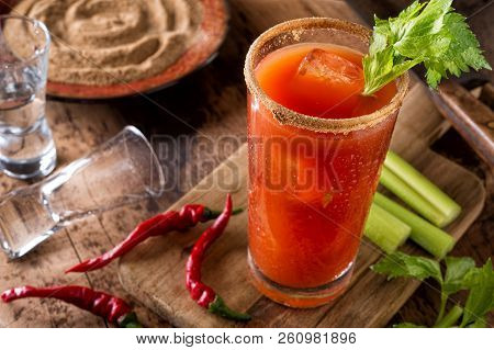 A Delicious Spicy Bloody Caesar Cocktail With Vodka, Tomato Juice, Clam Juice, Hot Sauce And Celery.