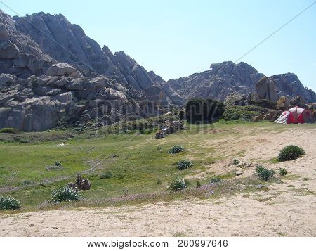 Nylon Tent Erected For Camping Vacation In Isolated Meadow, Sardinia, Italy