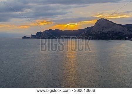 Sunset On The Black Sea Coast Of Crimea. View From The Top Of Cape Alchak To The West, Towards Novyy