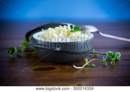 Sweet Boiled Vermicelli With Milk In A Ceramic Bowl