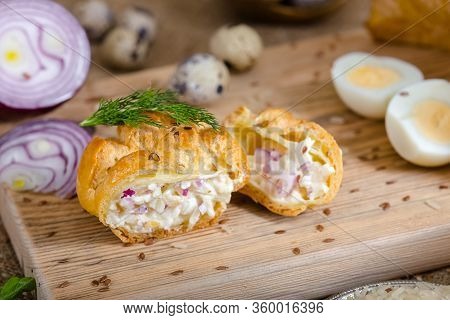Fresh Profiteroles Eclairs Lie On A Wooden Vintage Cutting Board, Fresh Boiled Squid, Chicken Boiled