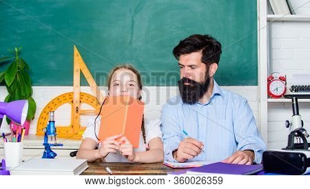 Explaining Science To Child. School Teacher And Schoolgirl. Man Bearded Teacher Excellent Pedagogue.
