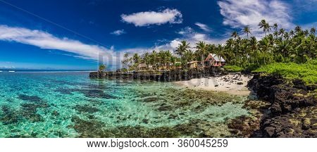 Vibrant tropical beach with palm trees, Upolu, Samoa.
