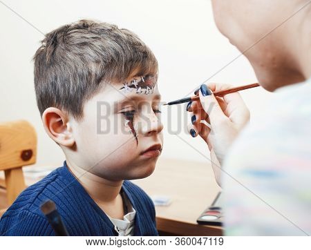 Little Cute Child Making Facepaint On Birthday Party, Zombie Apocalypse Facepainting, Halloween Prep
