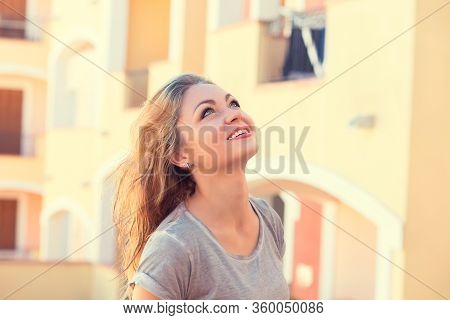 Carefree Happy Woman Looking Up Enjoying Sun On Her Face. Relaxing Enjoying Nature Sunset Sunrise. F