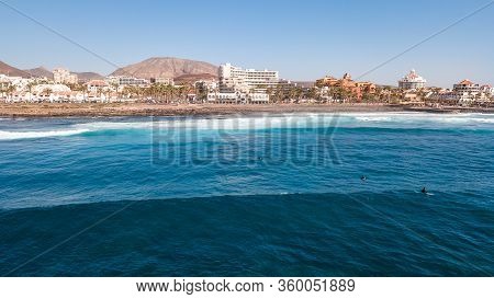 Tenerife, Canary Island, Spain Man Surfing On A Large Wave On Playa De Las Americas On The Coast Of 
