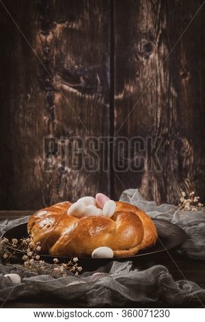 Easter Folar With Sugar Almods On Wooden Table Top.