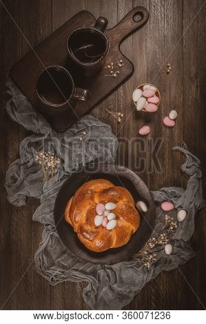 Easter Folar With Sugar Almods On Wooden Table Top.