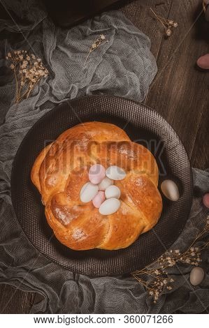 Easter Folar With Sugar Almods On Wooden Table Top.